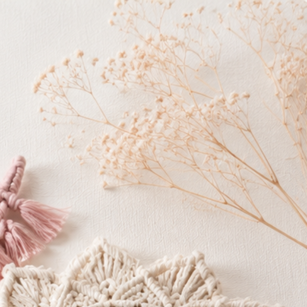 Dried botanicals beside macrame work
